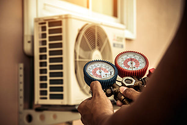 Professional Ac Installation technician working in Ames, IA